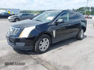 2014 Cadillac SRX with VIN 3GYFNAE30ES641616, listed as a IAAI auction lot 42000120 with 145,000 mi miles and . Bid and sale history available at DreamBid. Image 2.