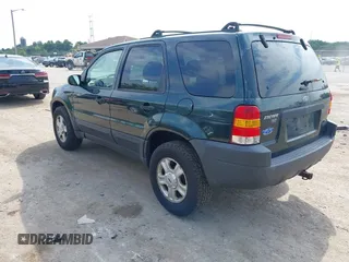 2004 Ford Escape XLT with VIN 1FMYU93124DA08711, listed as a IAAI auction lot 42798957 with 231,771 mi miles and . Bid and sale history available at DreamBid. Image 3.