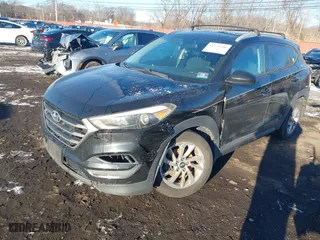 2016 Hyundai Tucson SE with VIN KM8J3CA42GU076476, listed as a IAAI auction lot 41272580 with 112,010 mi miles. Bid and sale history available at carsss.com. Image 19.