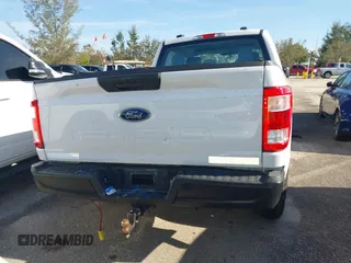 2022 Ford F-150 XL z VIN 1FTFX1E54NKD86627, wystawiony jako IAAI lot #41362024 z przebiegiem 32 712 mil mil oraz . Historia ofert i sprzedaży dostępna na DreamBid. Obrazek 16.