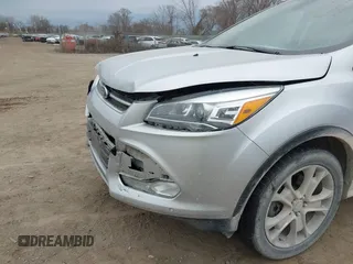 2015 Ford Escape Titanium with VIN 1FMCU9J92FUA60166, listed as a IAAI auction lot 41914080 with 103,122 mi miles and . Bid and sale history available at DreamBid. Image 6.