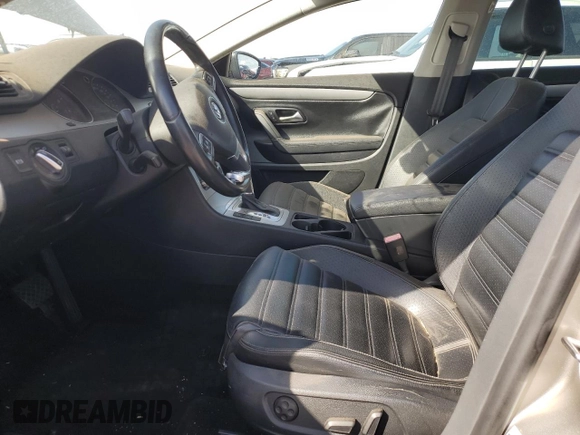 2010 Volkswagen CC Sport with VIN WVWMN7AN8AE562691, listed as a Copart auction lot 76957824 with 96,757 mi miles and Salvage Title. Bid and sale history available at DreamBid. Image 7.