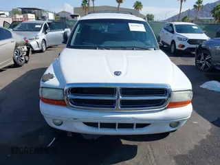 1999 Dodge Durango z VIN 1B4HS28Y1XF619973, wystawiony jako IAAI lot #42399672 z przebiegiem 192 812 mil mil oraz . Historia ofert i sprzedaży dostępna na DreamBid. Obrazek 6.