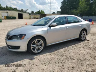 2014 Volkswagen Passat SE with VIN 1VWBT7A36EC047828, listed as a Copart auction lot 63711855 with 204,196 mi miles and Clean title. Bid and sale history available at DreamBid. Image 1.