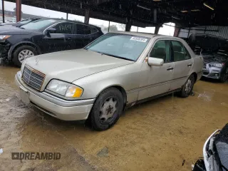 1997 Mercedes-Benz C with VIN WDBHA28E3VF530316, listed as a Copart auction lot 85938384 with 169,664 mi miles and Salvage Title. Bid and sale history available at carsss.com. Image 1.