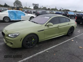 2013 BMW 6 Series 650i with VIN WBA6B2C59DDG66909, listed as a Copart auction lot 86329014 with 131,054 mi miles and Salvage Title. Bid and sale history available at carsss.com. Image 1.