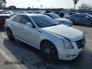 2010 Cadillac CTS with VIN 1G6DK5EVXA0102844, listed as a IAAI auction lot 41818267 with 127,517 mi miles and . Bid and sale history available at DreamBid. Image 1.
