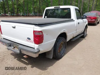 2003 Ford Ranger XL with VIN 1FTYR10D03TA39871, listed as a IAAI auction lot 42092257 with 282,924 mi miles. Bid and sale history available at carsss.com. Image 4.