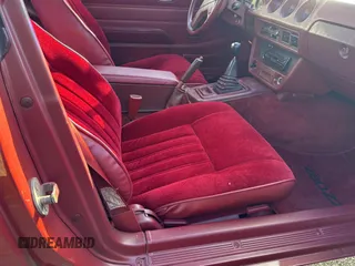 1980 Datsun 280ZX z VIN HS130198111, wystawiony jako Copart lot #84153084 z przebiegiem 106 400 mil mil oraz Tytuł czysty. Historia ofert i sprzedaży dostępna na DreamBid. Obrazek 5.