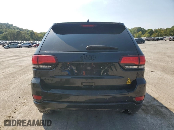 2018 Jeep Grand Cherokee Laredo E with VIN 1C4RJFAG9JC390597, listed as a Copart auction lot 71450474 with 69,645 mi miles and Salvage title. Bid and sale history available at DreamBid. Image 6.