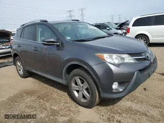 2015 Toyota RAV4 XLE with VIN 2T3RFREV1FW265335, listed as a Copart auction lot 50561665 with 173,374 mi miles and Salvage Title. Bid and sale history available at carsss.com. Image 4.