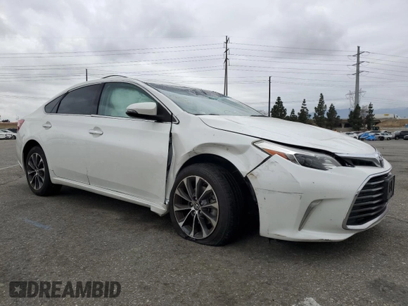 2016 Toyota Avalon Limited with VIN 4T1BK1EB8GU227258, listed as a Copart auction lot 53635075 with 105,041 mi miles and Salvage Title. Bid and sale history available at DreamBid. Image 4.