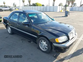 2000 Mercedes-Benz C 230 Kompressor z VIN WDBHA24G4YA799207, wystawiony jako IAAI lot #42010800 z przebiegiem 126 478 mil mil oraz . Historia ofert i sprzedaży dostępna na DreamBid. Obrazek 1.