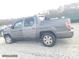 2011 Honda Ridgeline RTS with VIN 5FPYK1F46BB001193, listed as a Copart auction lot 85199714 with 238,241 mi miles and Salvage Title. Bid and sale history available at carsss.com. Image 2.