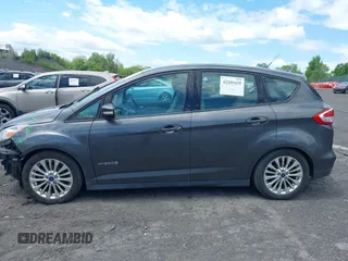 2018 Ford C-Max SE z VIN 1FADP5AU4JL101950, wystawiony jako IAAI lot #42289435 z przebiegiem 218 413 mil mil oraz . Historia ofert i sprzedaży dostępna na DreamBid. Obrazek 14.