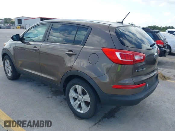2013 Kia Sportage LX with VIN KNDPB3A28D7375304, listed as a IAAI auction lot 42566081 with 17,890 mi miles and . Bid and sale history available at DreamBid. Image 3.