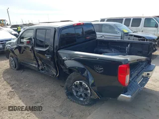 2019 Nissan Frontier SV with VIN 1N6AD0EV6KN771045, listed as a IAAI auction lot 41311008 with 129,071 mi miles and . Bid and sale history available at DreamBid. Image 3.