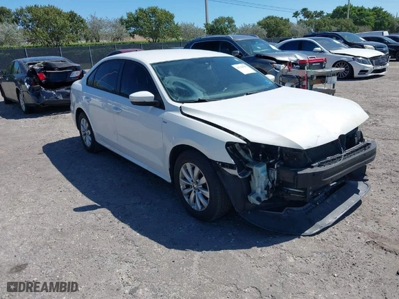 2015 Volkswagen Passat 1.8T S with VIN 1VWAT7A35FC038826, listed as a IAAI auction lot 41742799 with 123,468 mi miles. Bid and sale history available at carsss.com. Image 1.