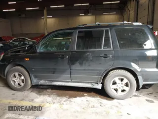 2007 Honda Pilot EX-L with VIN 2HKYF18647H504953, listed as a IAAI auction lot 41750435 with 186,097 mi miles and . Bid and sale history available at DreamBid. Image 14.