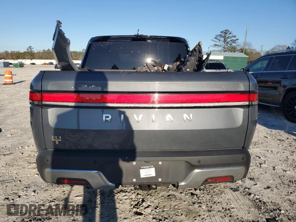 2023 Rivian R1T Adventure z VIN 7FCTGAAA1PN022134, wystawiony jako Copart lot #85545774 z przebiegiem 48 951 mil mil oraz Szkoda całkowita • Salvage title. Historia ofert i sprzedaży dostępna na DreamBid. Obrazek 6.