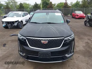 2024 Cadillac XT6 AWD Luxury with VIN 1GYKPBR45RZ750986, listed as a IAAI auction lot 42605419 with 50,929 mi miles and . Bid and sale history available at DreamBid. Image 13.