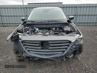 2023 Mazda CX-9 Touring with VIN JM3TCBCY4P0654597, listed as a Copart auction lot 55920855 with 58,534 mi miles and Salvage title. Bid and sale history available at DreamBid. Image 5.