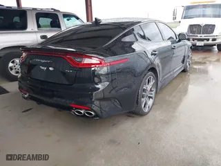 2020 Kia Stinger GT1 with VIN KNAE45LC5L6075904, listed as a IAAI auction lot 40870197 with 51,600 mi miles. Bid and sale history available at carsss.com. Image 4.