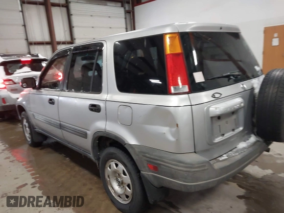 2001 Honda CR-V LX with VIN JHLRD28451S011633, listed as a IAAI auction lot 41566216 with 185,533 mi miles. Bid and sale history available at carsss.com. Image 3.