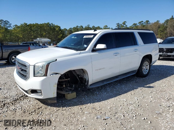 2015 GMC Yukon XL SLT with VIN 1GKS1HKC5FR255473, listed as a Copart auction lot 88680595 with 198,265 mi miles and Salvage Title. Bid and sale history available at carsss.com. Image 1.