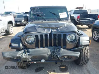 2022 Jeep Wrangler Unlimited Sport S with VIN 1C4HJXDG5NW105931, listed as a IAAI auction lot 42349628 with 37,314 mi miles and . Bid and sale history available at DreamBid. Image 6.
