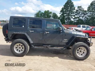 2008 Jeep Wrangler Unlimited Sahara with VIN 1J4GA591X8L520621, listed as a IAAI auction lot 42525613 with 184,239 mi miles and . Bid and sale history available at DreamBid. Image 13.