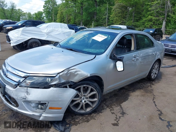 2012 Ford Fusion SEL z VIN 3FAHP0JA3CR127535, wystawiony jako IAAI lot #42169197 z przebiegiem 192 543 mil mil oraz . Historia ofert i sprzedaży dostępna na DreamBid. Obrazek 6.