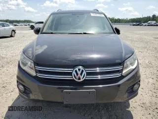 2012 Volkswagen Tiguan SEL with VIN WVGAV7AX2CW605399, listed as a Copart auction lot 55201935 with 128,527 mi miles and Clean Title. Bid and sale history available at DreamBid. Image 5.