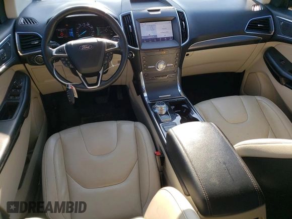 2020 Ford Edge Titanium с VIN 2FMPK3K90LBB63624, выставлен на аукционе Copart как лот 55143825 с пробегом 105 394 миль миль и Списание • Salvage title. История ставок и продаж доступна на DreamBid. Изображение 8.