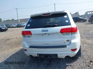 2015 Jeep Grand Cherokee Overland with VIN 1C4RJFCGXFC880096, listed as a IAAI auction lot 42706085 with 74,044 mi miles and . Bid and sale history available at DreamBid. Image 16.