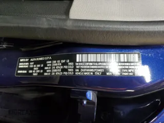 2018 Alfa Romeo Stelvio z VIN ZASFAKAN0J7C04021, wystawiony jako Copart lot #53308355 z przebiegiem 58 192 mil mil oraz Szkoda całkowita • Salvage title. Historia ofert i sprzedaży dostępna na DreamBid. Obrazek 14.