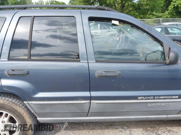 2002 Jeep Grand Cherokee Laredo with VIN 1J4GW48S92C150162, listed as a IAAI auction lot 42471732 with 171,677 mi miles and . Bid and sale history available at DreamBid. Image 16.