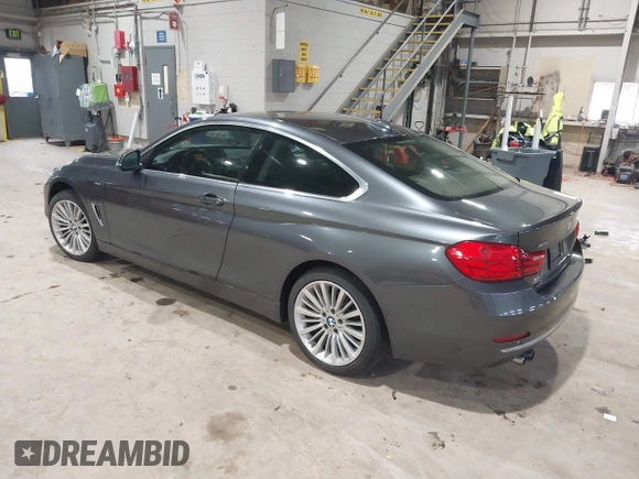2014 BMW 4 Series 428i xDrive with VIN WBA3N9C56EF721564, listed as a IAAI auction lot 41737409 with 42,052 mi miles and . Bid and sale history available at DreamBid. Image 3.