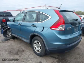2014 Honda CR-V LX with VIN 2HKRM3H32EH517323, listed as a IAAI auction lot 42020715 with 121,389 mi miles. Bid and sale history available at carsss.com. Image 3.