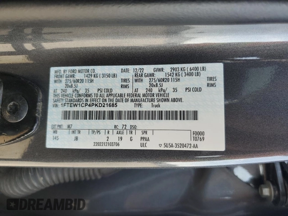 2023 Ford F-150 XL with VIN 1FTEW1CP4PKD21685, listed as a Copart auction lot 54992615 with 27,252 mi miles and Salvage title. Bid and sale history available at DreamBid. Image 12.