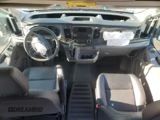 2023 Ford Transit Cargo z VIN 1FTBR1X8XPKB14862, wystawiony jako Copart lot #83661874 z przebiegiem Nie podano mil oraz Szkoda całkowita • Salvage title. Historia ofert i sprzedaży dostępna na DreamBid. Obrazek 8.