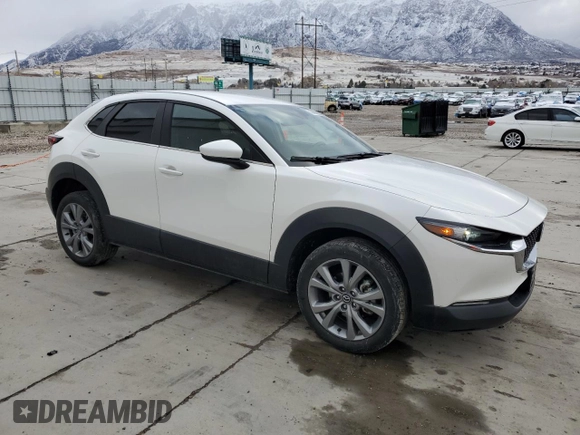 2022 Mazda CX-30 S Select with VIN 3MVDMBBL2NM457095, listed as a Copart auction lot 48400995 with 33,438 mi miles and Salvage Title. Bid and sale history available at DreamBid. Image 4.