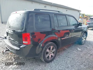 2013 Honda Pilot Touring with VIN 5FNYF3H93DB031630, listed as a IAAI auction lot 42237899 with 198,523 mi miles and . Bid and sale history available at DreamBid. Image 4.
