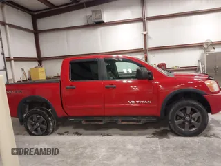 2012 Nissan Titan SV with VIN 1N6AA0EC7CN327973, listed as a IAAI auction lot 41841596 with 148,519 mi miles. Bid and sale history available at carsss.com. Image 13.