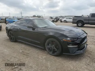 2023 Ford Mustang GT with VIN 1FA6P8CF7P5304031, listed as a Copart auction lot 54693515 with 27,048 mi miles and Salvage Title. Bid and sale history available at carsss.com. Image 4.