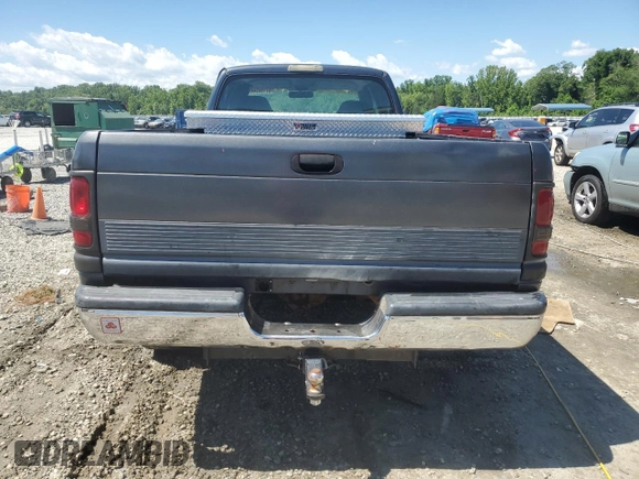2002 Dodge Ram 2500 with VIN 3B7KC236X2M268324, listed as a Copart auction lot 57196344 with 179,647 mi miles and Salvage Title. Bid and sale history available at carsss.com. Image 6.