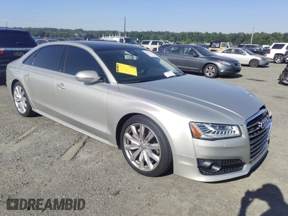 2017 Audi A8 with VIN WAU44AFD3HN014802, listed as a IAAI auction lot 42573537 with 121,096 mi miles and . Bid and sale history available at DreamBid. Image 1.