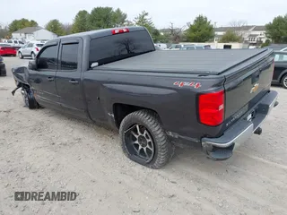 2015 Chevrolet Silverado 1500 LT with VIN 1GCVKREC5FZ224506, listed as a IAAI auction lot 41780803 with 104,960 mi miles and . Bid and sale history available at DreamBid. Image 3.