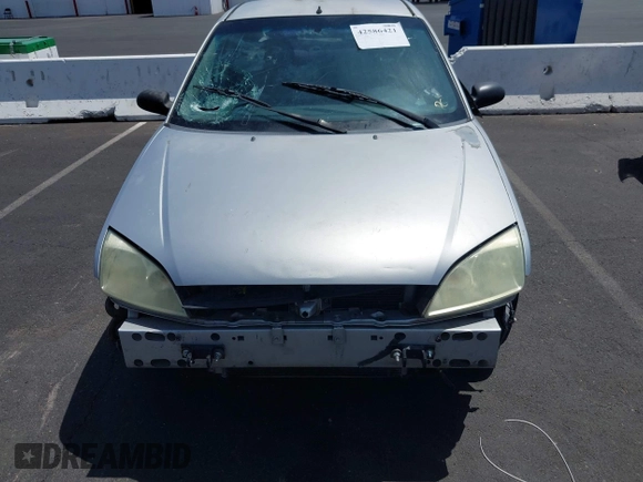 2007 Ford Focus S z VIN 1FAHP34NX7W163158, wystawiony jako IAAI lot #42586421 z przebiegiem 123 131 mil mil oraz . Historia ofert i sprzedaży dostępna na DreamBid. Obrazek 6.
