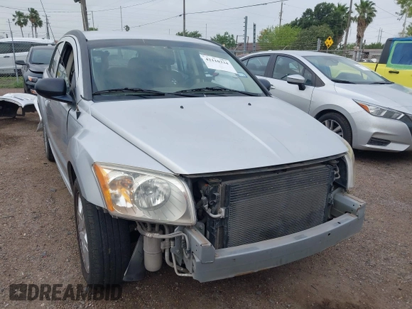 2009 Dodge Caliber SXT with VIN 1B3HB48A59D143888, listed as a IAAI auction lot 42110334 with 182,674 mi miles and . Bid and sale history available at DreamBid. Image 1.